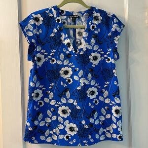 Blue and white floral blouse